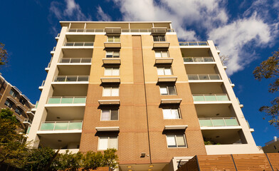 Residential high rise apartment building in inner Sydney suburb NSW Australia. Residential complex in leafy suburbia. Urban living high density suburban city 