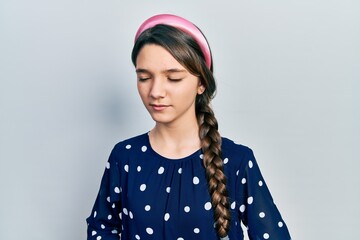 Young brunette girl wearing elegant look with hand on stomach because nausea, painful disease feeling unwell. ache concept.