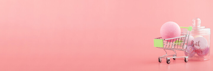 body cosmetics, natural bath bombs banner in shopping cart, pink salt