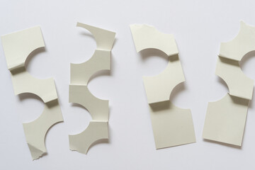 paper shapes with semi-circle cut outs