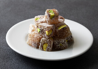 Traditional pistachio Turkish delight in a plate
