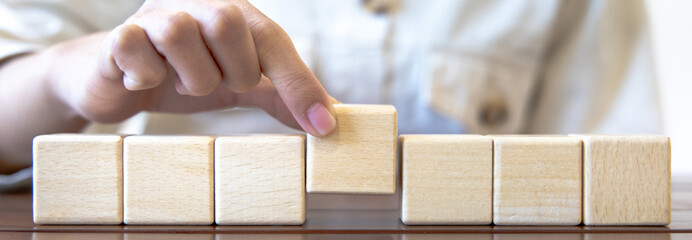 Wooden block with copy spase or Fill in the blank, Wooden toys, An empty space to fill up seven characters, Arrange the dice horizontally. © Puwasit Inyavileart