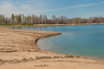 white sand dune desert and lake