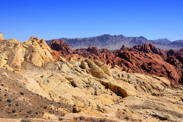 Fototapeta na wymiar Multiple colors of Fire Canyon in the desert of Valley of Fire State Park, Nevada, USA
