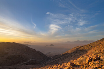 Dust storm at sunset in the Namib Desert