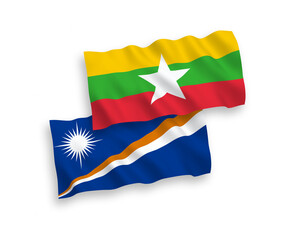 Flags of Republic of the Marshall Islands and Myanmar on a white background