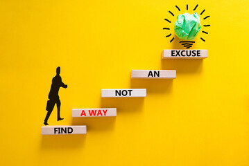 Find a way not excuse symbol. Concept words Find a way not an excuse on wooden blocks on a...