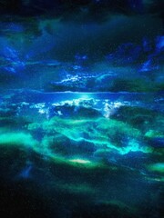 Blue cosmic nebula, abstract background. Millions of stars in the universe. Colorful stardust in space.