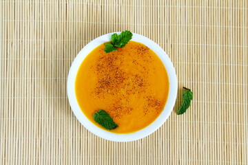 mango juice or mango pulp or traditional indian recipe aamrus in bowl,top view