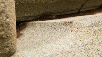 Close up detail of Megalithic stone walls, craftmenship in ancient city of cusco.
