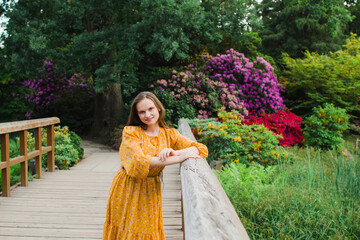 beautiful woman in summer in yellow dress