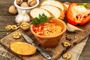 Traditional Middle Eastern dip Muhammara. Roasted red bell pepper with walnuts and spices