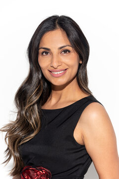 Studio images of beautiful Asian Indian woman in a black dress.