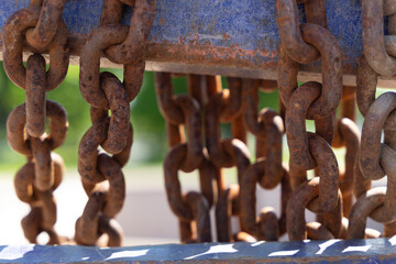 Heavy steel rusty chains close up