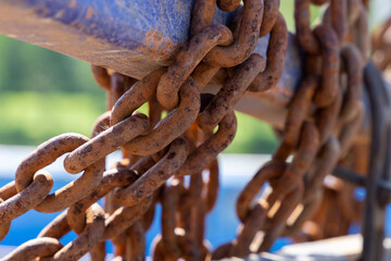 Heavy steel rusty chains close up