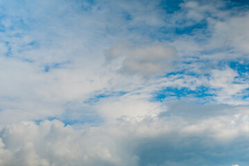 Dramatic white clouds against blue sky. Daylight, cloudy day. Nature, freedom and peaceful concept