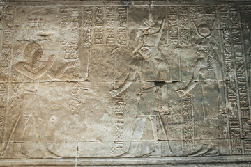 Bas-reliefs of the ancient Temple of Horus in Edfu, Egypt - obrazy, fototapety, plakaty