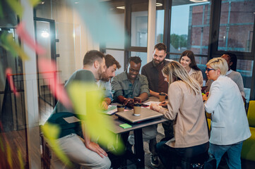 Multiracial business team working together and having a meeting in the office