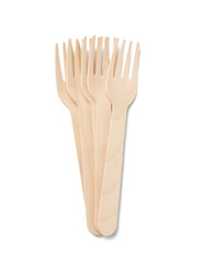 Wooden disposable brown forks on a white isolated background
