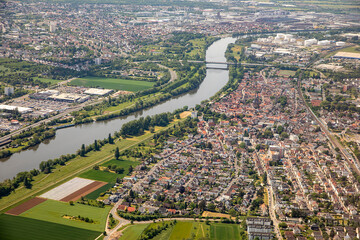 scenic aerial of Kelsterbach and Raunheim after takeoff with river Main, Hesse