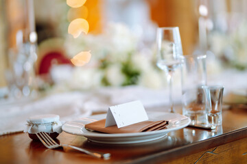 Banquet table with wedding and festive serving. Wedding, birthday, party, event concept.