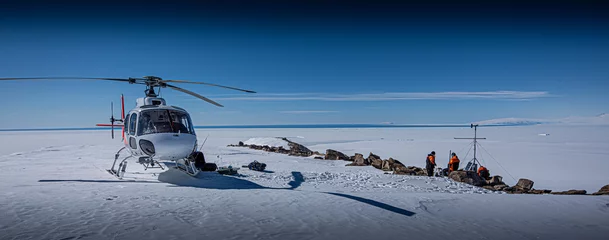 Tuinposter Scientists install experiments in dry valleys, Antarctica, via helicopter © Stuart