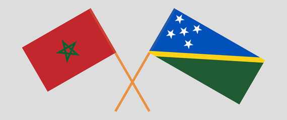 Crossed flags of Morocco and Solomon Islands. Official colors. Correct proportion
