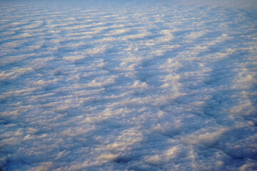 Sunset above a sea of clouds.