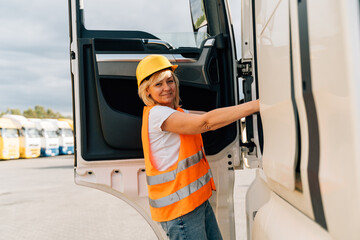 Middle age truck driver woman, trucker occupation in Europe for females
