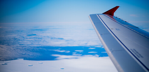 View of aircraft wing flying over Antarctica © Stuart