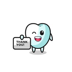 the mascot of the tooth holding a banner that says thank you