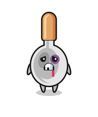 injured cooking spoon character with a bruised face