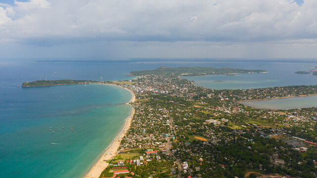 The town of Trincomalee with tourist infrastructure and beaches in Sri Lanka view from above.