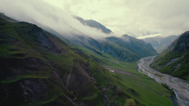 panorama of Caucasus mountains and Dariali Gorge, Kazbegi district, Mtskheta-Mtianeti region, Georgia. aerial shot. High quality 4k footage