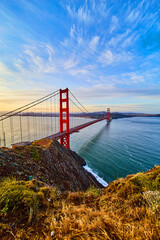 Renowned and iconic Golden Gate Bridge in San Francisco at sunrise