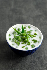 Cendol is an Iced Sweet Dessert, Contains Drop of Green Rice Flour Jelly, Coconut Milk and Palm Sugar Syrup.
