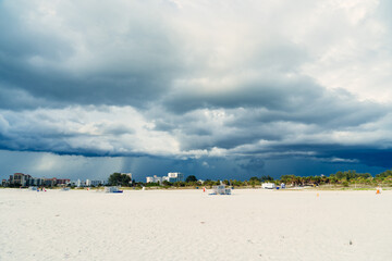 Tornado storm is approaching to a beach