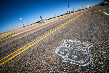 Route 66 iconic highway with midpoint marking on road