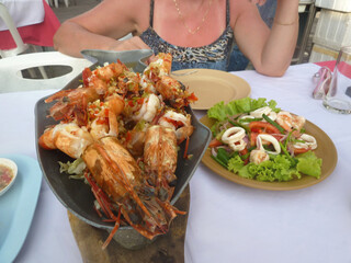Delicious fresh cooked and grilled whole Lobster. Thai BBQ lobster, mookata ,Thai buffet restaurant, grilled seafood