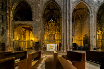 The arched, medieval nave with altars and chapels inside the Girona Cathedral in Girona, Spain.