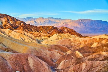 Stunning sunrise colors in desert mountains of Death Valley