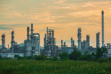 Fototapeta na wymiar Oil​ refinery​ and​ plant and tower column of Petrochemistry industry in oil​ and​ gas​ ​industrial with​ cloud​ red ​sky