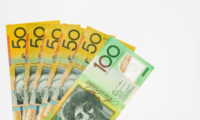 Banknotes of 50 and 100 Australian dollars on white background.