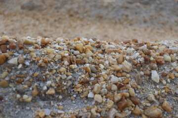 small rocks carried along by a river