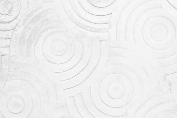 Fototapeta na wymiar White concrete texture wall background. Abstract grey paint floor stamped concrete surface curved circle polished on walkway in garden. 