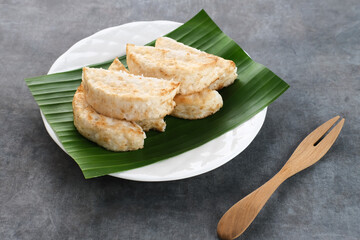 Kue Pancong, Gandos or Bandros is an Indonesian traditional snack made from a mixture of rice flour, grated coconut, and coconut milk.
