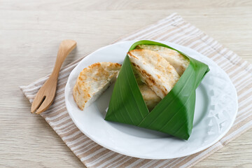 Kue Pancong, Gandos or Bandros is an Indonesian traditional snack made from a mixture of rice flour, grated coconut, and coconut milk.
