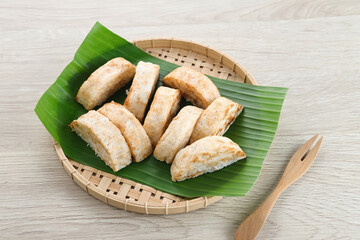 Kue Pancong, Gandos or Bandros is an Indonesian traditional snack made from a mixture of rice...