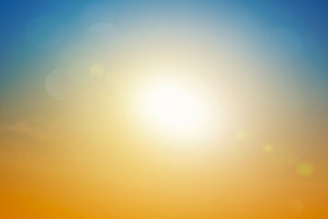 Abstract blurred sunlight beach colorful blurred bokeh background with retro effect autumn sunset sky have blue bright, white, and color orange calm.