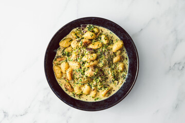 healthy plant-based food, vegan cheese and spinach potato gnocchi